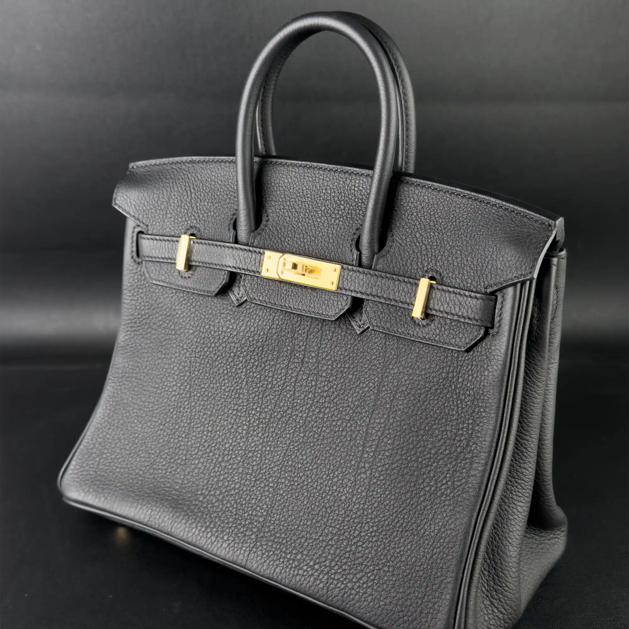 Hermes Birkin 25 Noir Togo Gold Hardware - Side 1