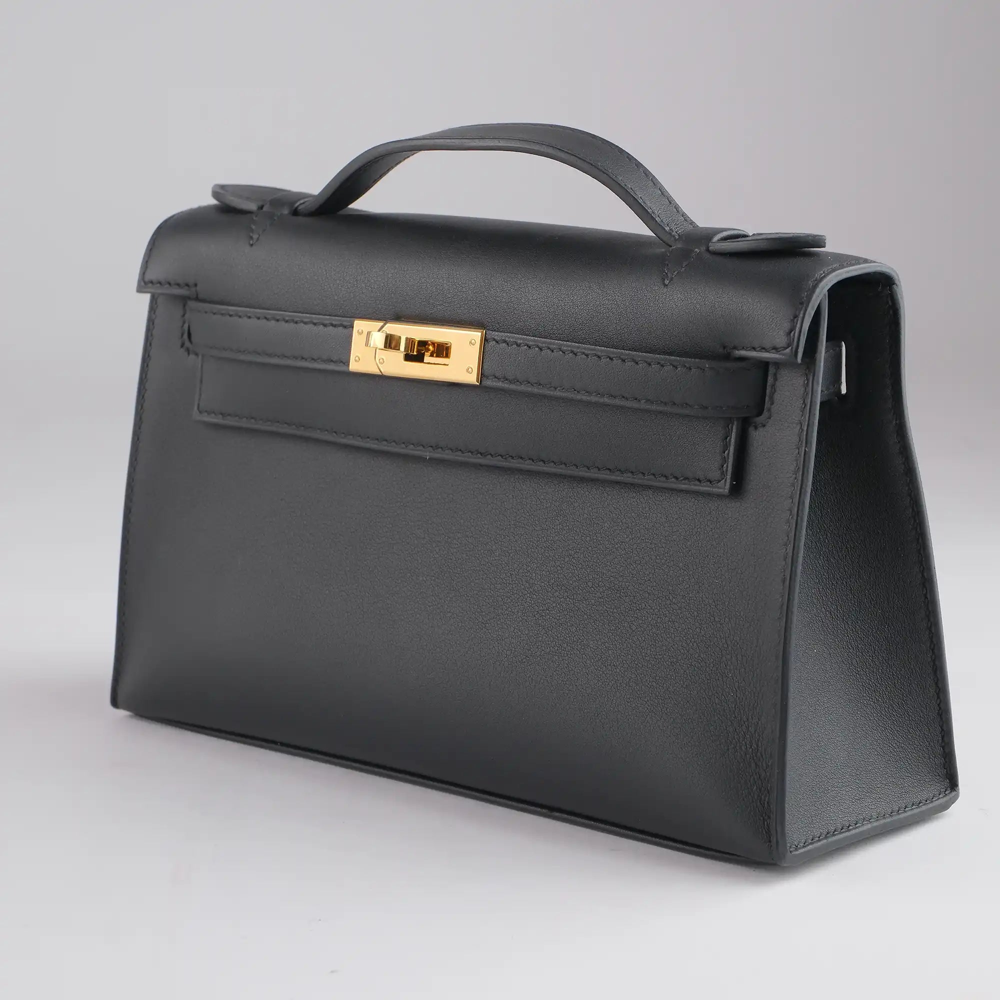 Hermès Kelly Pochette Black Swift Leather Gold Hardware - Side 1
