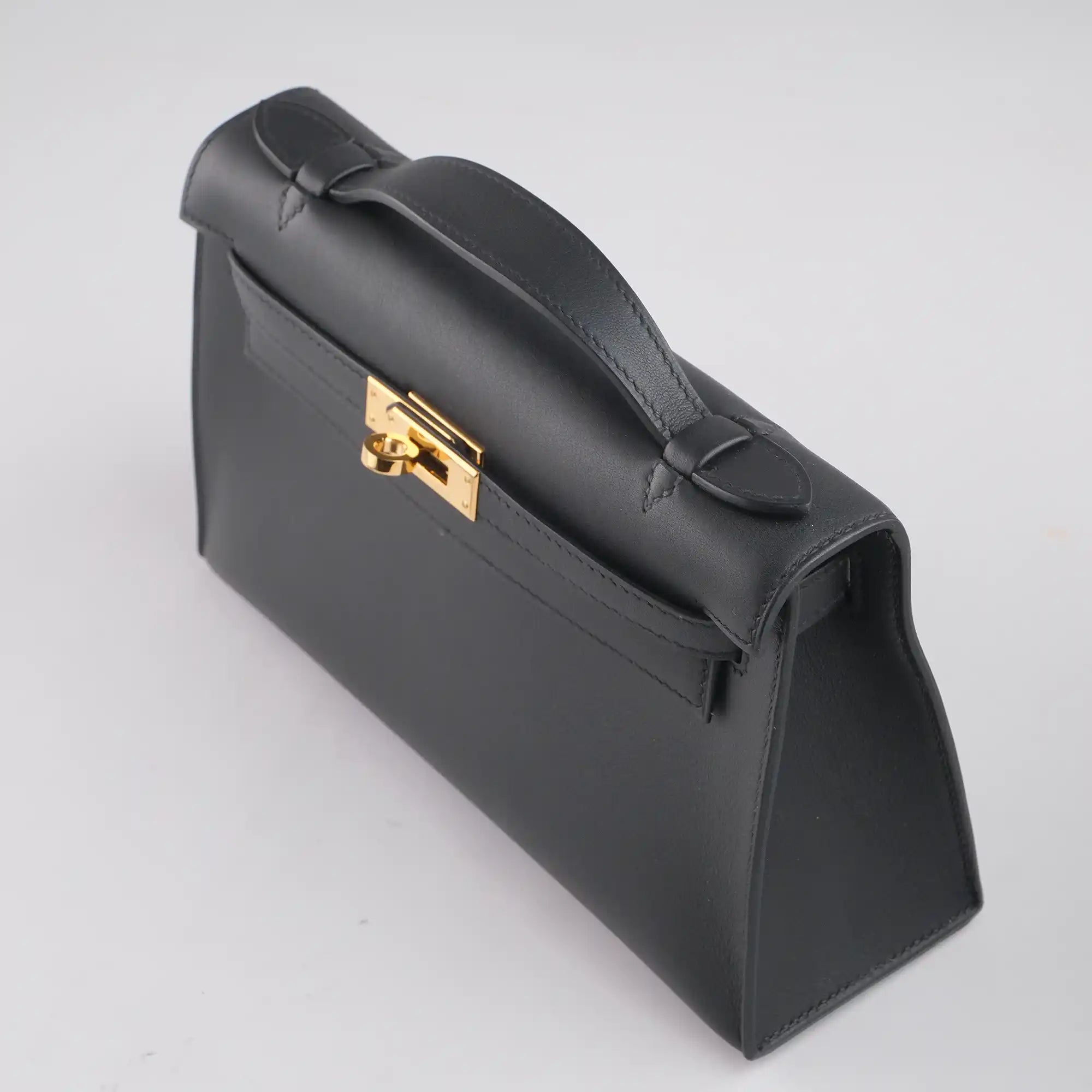 Hermès Kelly Pochette Black Swift Leather Gold Hardware - Top 1