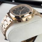 Patek Philippe Nautilus Travel Time Chronograph 5990/1R-001 - Side 2