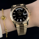 Rolex Day-Date 40 Black Baguette Yellow Gold 228238 - Wrist