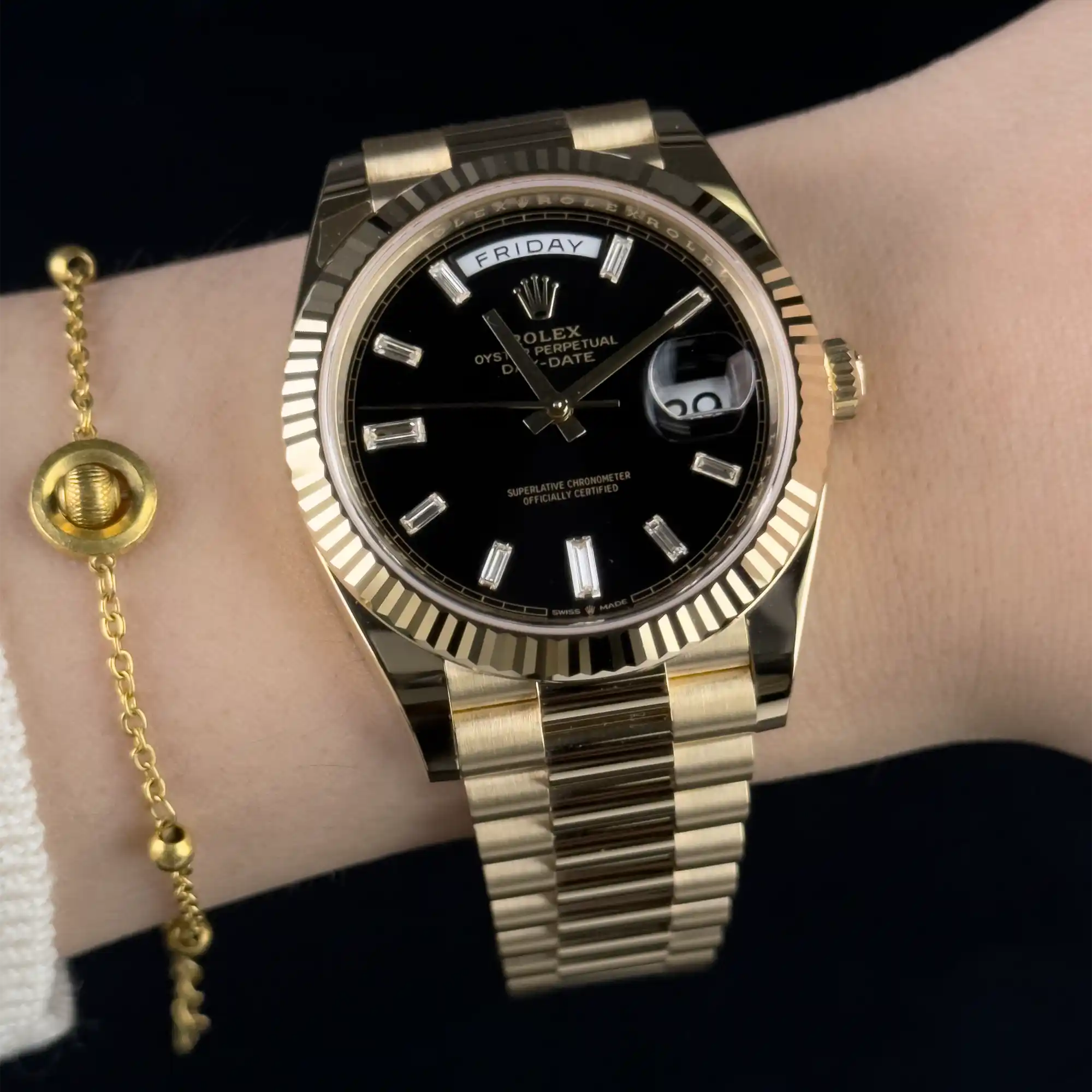 Rolex Day-Date 40 Black Baguette Yellow Gold 228238 - Wrist