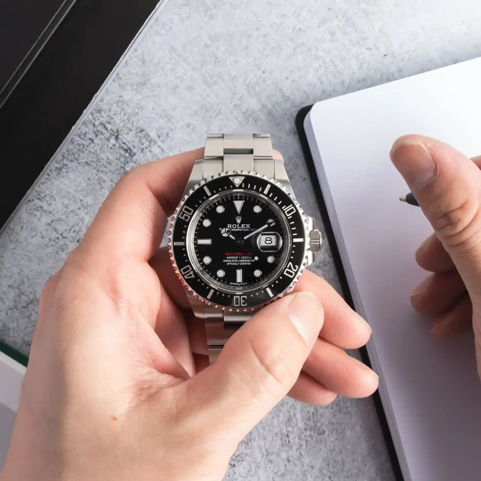 Rolex Sea-Dweller Red Lettering Black Dial 126600 - Banner