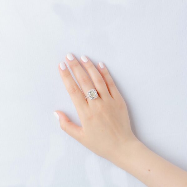 18k White Gold Cushion Cut Halo Diamond Ring on Hand